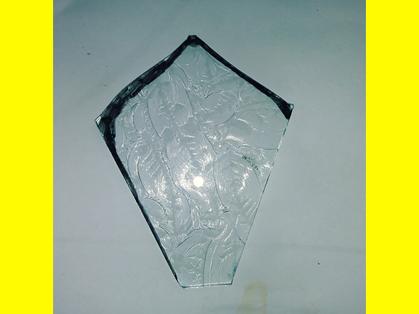 Hey! look, the glass guys even managed to match the pattern!  Now I just have to grind it for a perfect fit.